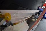 Aplikace ochranné transparentní folie na spodní část lodi pod vodorysku